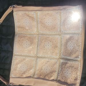 The Sak Tan Shoulder Bag with Intricate Cutout Design